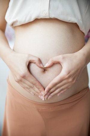 China pregnant belly close-upの写真素材