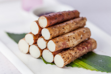 Chinese yam in white plate.の写真素材