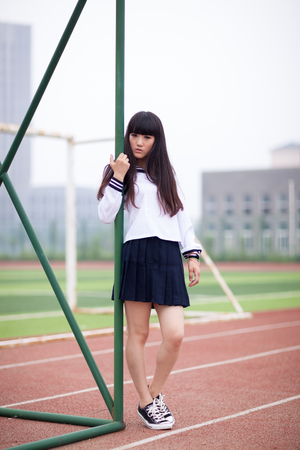 Young asian girl, standing on the campusのeditorial素材