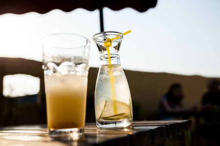 Lemon water in a glass bottleの写真素材
