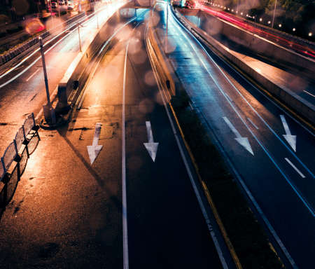 the light trails on the street in shanghai china.の写真素材