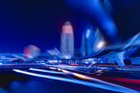 the light trails on the street in shanghai china.の写真素材