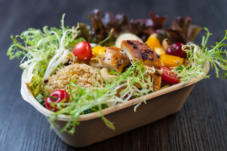 salad with fried chickenの写真素材