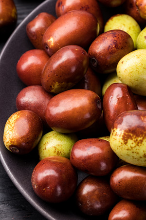 Jujube on bowlの写真素材