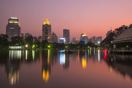 Twilight scene of lake and buildingの写真素材