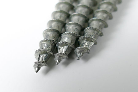 Set of screws on the white background , metal screw, steel screw, screw macro