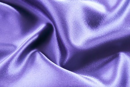 Beautiful smooth elegant wavy violet purple satin silk luxury cloth fabric texture, abstract background design. Card or banner.の写真素材
