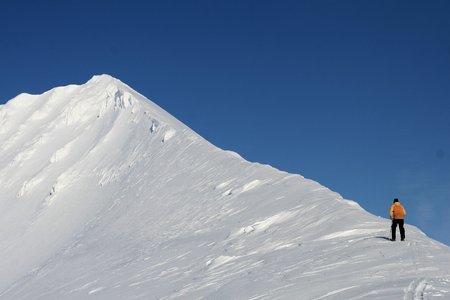 person climbing snow, Svalbard Norwayの写真素材