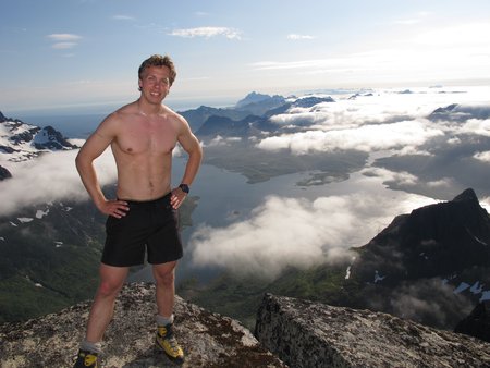 man on mountain, Lofoten Norwayの写真素材