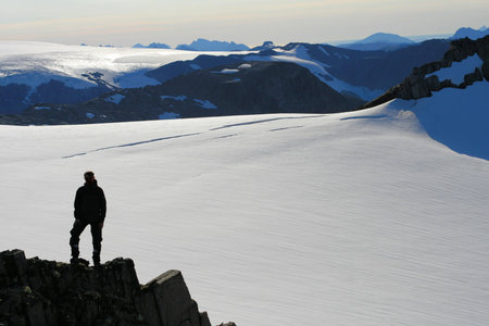 man on mountain, Lofoten Norway