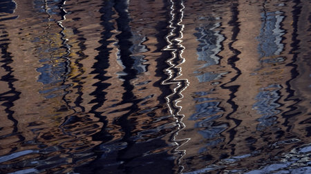 River with reflection and ripples in urban exterior scene