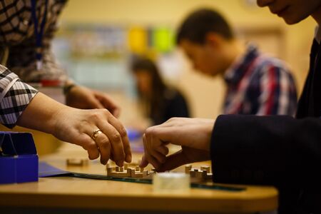 wooden game block abstract with bokeh puzzlesの写真素材