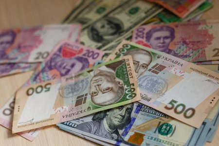A lot of Ukrainian hrynias and one hundred dollars USA.
