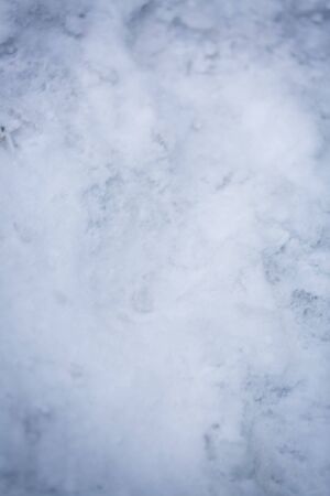 White blue glitter from fresh snow texture backgroundの写真素材
