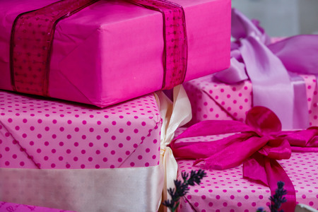 Pink gift boxes with ribbon bow collection. Holiday present. Objects isolated on white background pink gift boxの写真素材