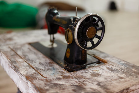 The old sewing machine on a white backgroundの写真素材
