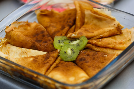 delicious pancakes in a stack with melting butter and maple syrupの写真素材