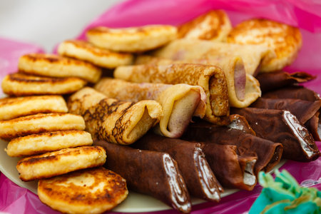 delicious pancakes in a stack with melting butter and maple syrupの写真素材