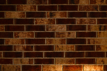 empty loft room with red brick wall and wooden floorの写真素材