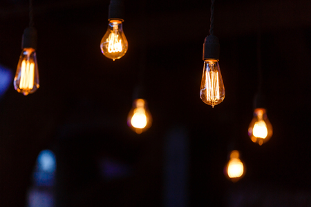 Luxury retro light bulb glowingの写真素材