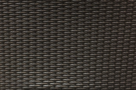 Black rattan weave texture.