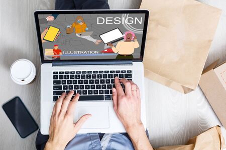 handsome hipster modern man designer working home using laptop at homeの写真素材