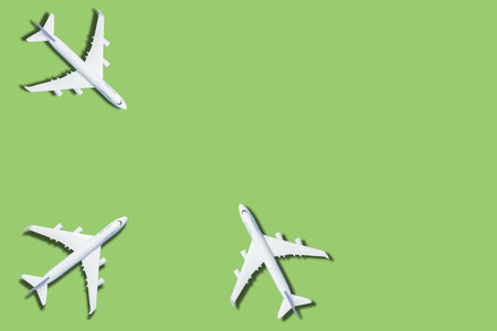 Model plane,airplane on green color background.