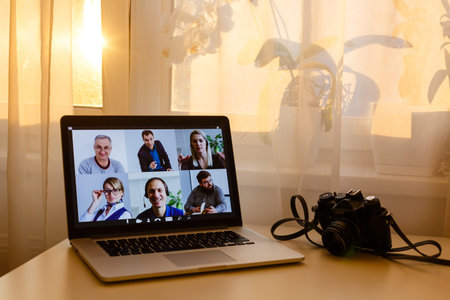 Global communication concept using video conferencing on a laptopの写真素材