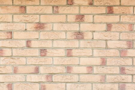 red brick wall texture grunge background with vignetted corners, may use to interior design