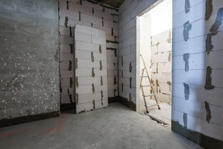 Stepladder standing in the room to renovateの写真素材