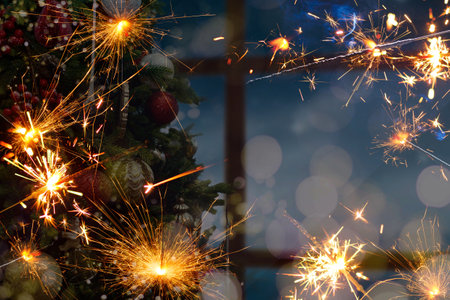 Christmas sparkler with background Christmas light bokeh Happy new yearの写真素材