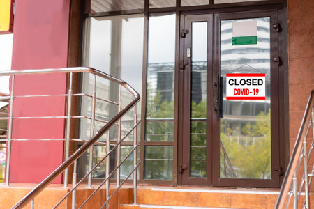 Sorry we are closed sign board hanging on door of cafe. High quality photoの写真素材