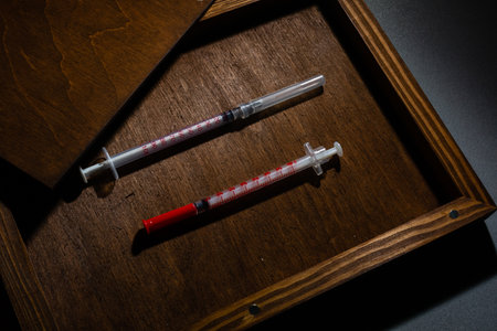 Corona virus vaccine, Covid-19 vaccine in the box. White background and syringes.の写真素材