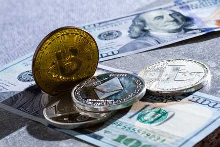 Bitcoin chart on virtual screen money concept.Gold bitcoins with graph chart and digital technology background.の写真素材