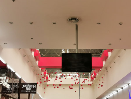 LCD TV with empty copy space, ceiling monitor Kyiv, Ukraine - December 16, 2019:のeditorial素材