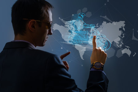 E-commerce concept with a person touching a button on a digital interface with icons of delivery, delivery truck. symbol of online purchase on internetの写真素材