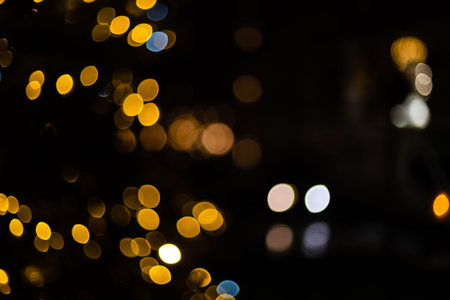 Christmas Background. Golden Holiday Abstract Glitter Defocused Background. Blurred Bokeh