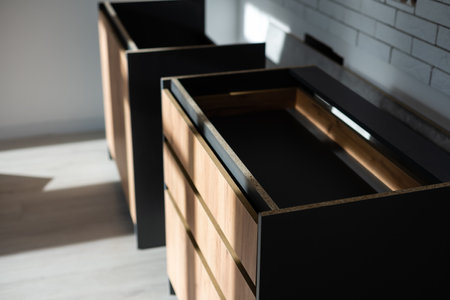 furniture, home and moving concept, installation and assembly of furniture in a new apartmentの写真素材