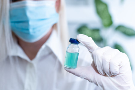 Vaccine vial dose flu shot drug needle syringe,medical concept vaccination hypodermic injection...