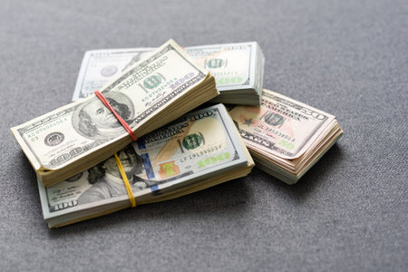a pack of lies the US currency on background of dollarsの写真素材
