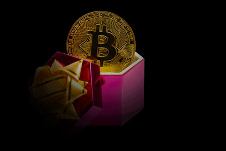 Coin bitcoin in a gift box for a ring or jewelry the concept of crypto currency the best giftの写真素材
