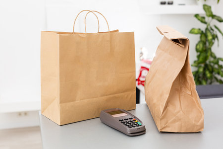 pos terminal and package delivery, parcel delivery.の写真素材