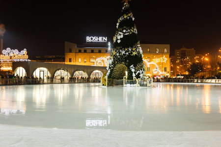 Ice skaters having fun in Kyiv, factory Roshen, Kyiv, UKRAINE - DECEMBER 08, 2019のeditorial素材