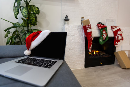 laptop stands near the fireplace, Christmasの写真素材