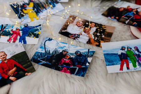 Photo album in remembrance and nostalgia in Christmas, winter season, on wood floor. photo of retro...