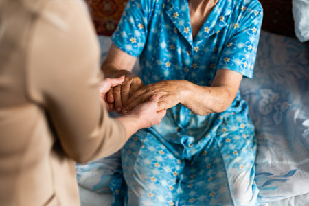 Senior woman with her home caregiverの写真素材