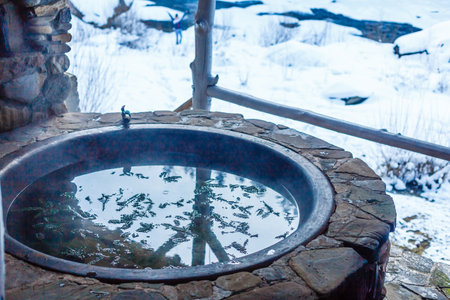 outdoor thermal bath in winterの写真素材
