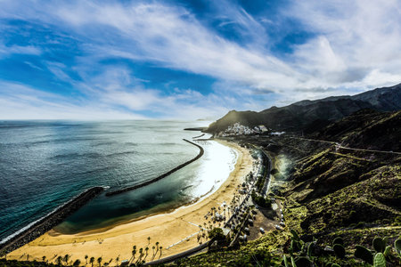 View of famous beach and ocean lagoon Playa de las Teresitas,Tenerife, Canary islands, Spainの写真素材