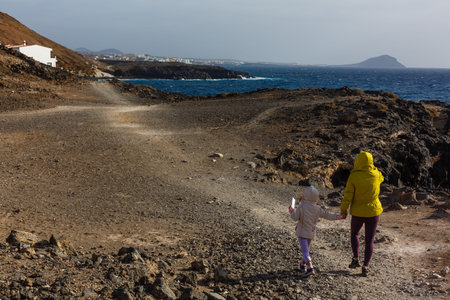 mother and daughter travel in mountains tenerife