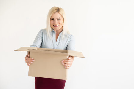 Moving House, Moving Office, Box. woman with boxの写真素材